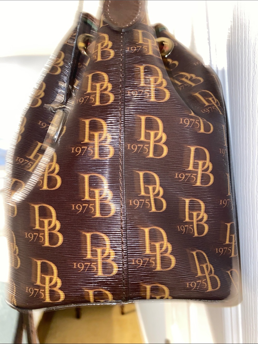 Dooney & Bourke Brown DB Monogram Braided Drawstring Bucket Bag - Picture 6 of 12